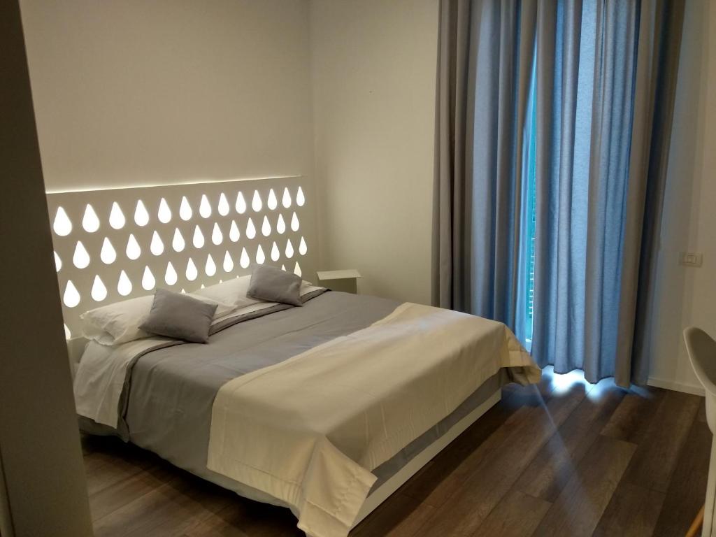 Postel nebo postele na pokoji v ubytování Dimora Mefite-Camere con Bagno Privato e Self check-in