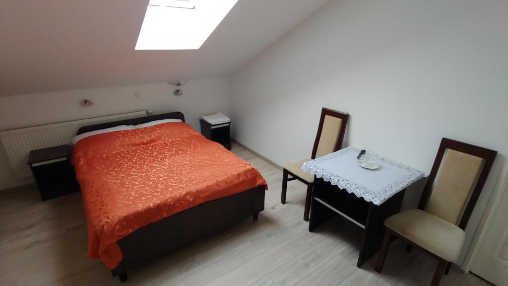 Postel nebo postele na pokoji v ubytování Hotel E7