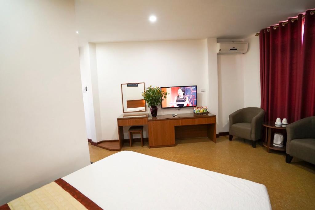 TV a/nebo společenská místnost v ubytování Hanoi Star Hotel