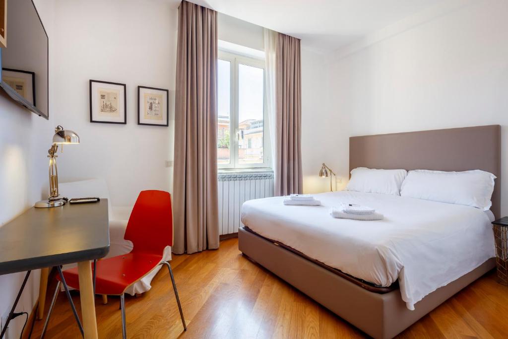 Posteľ alebo postele v izbe v ubytovaní HT Residence Maximus