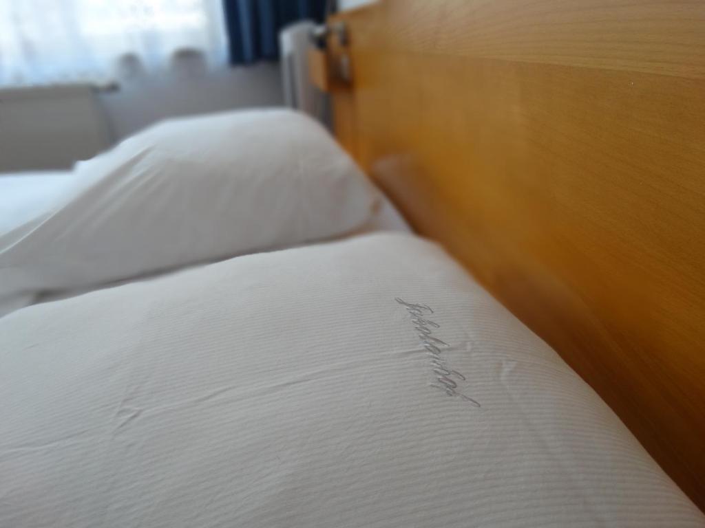 Postel nebo postele na pokoji v ubytování Jakoberhof