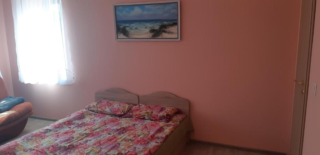 Postel nebo postele na pokoji v ubytování Little Amber Apartments