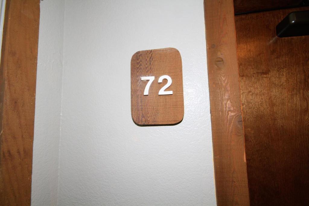 a clock on a wall with the number on it at Mountainback #72, Corner Unit in Mammoth Lakes