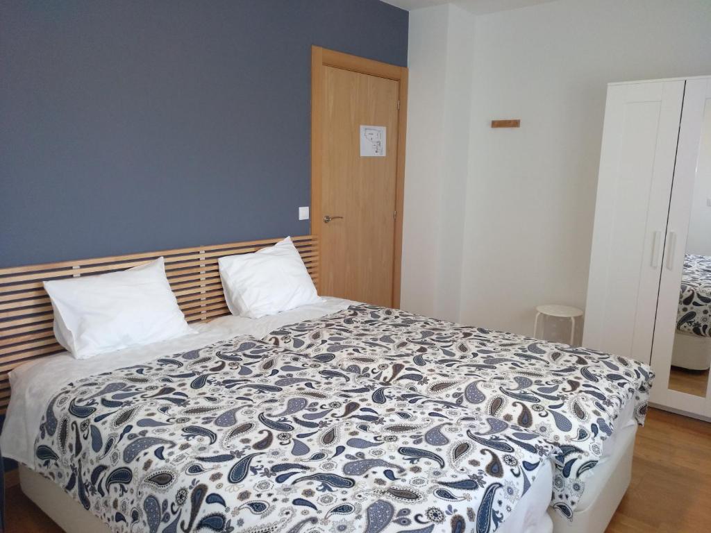 Postel nebo postele na pokoji v ubytování Apartamento Turistico Cigüeña de Arguedas
