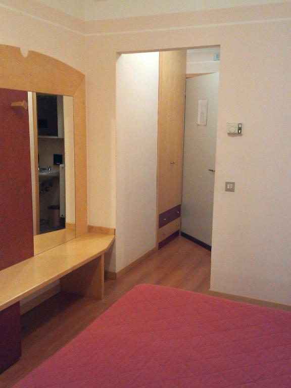 Postel nebo postele na pokoji v ubytování Hotel Palladio
