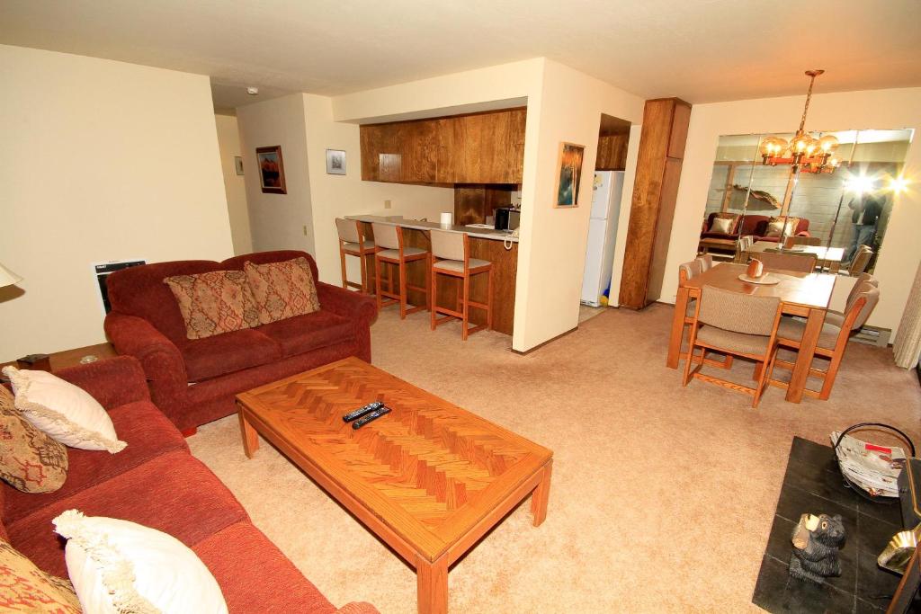 a living room with a couch and a table at Discovery 4 #153 in Mammoth Lakes