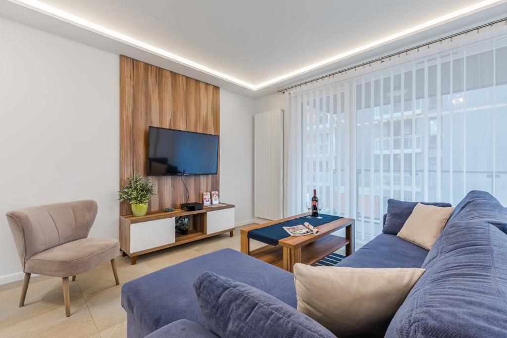 TV a/nebo společenská místnost v ubytování Loft Apartments