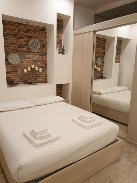 A bed or beds in a room at Kibilù - Viale Bligny - Porta Romana - Università Bocconi