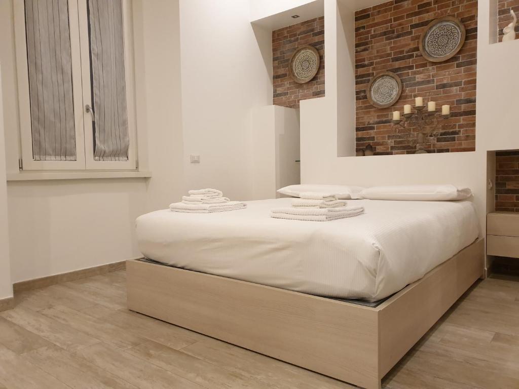 A bed or beds in a room at Kibilù - Viale Bligny - Porta Romana - Università Bocconi