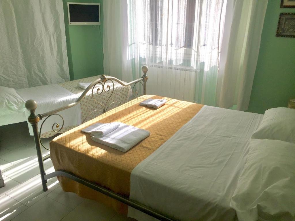 Postel nebo postele na pokoji v ubytování 6 Keys