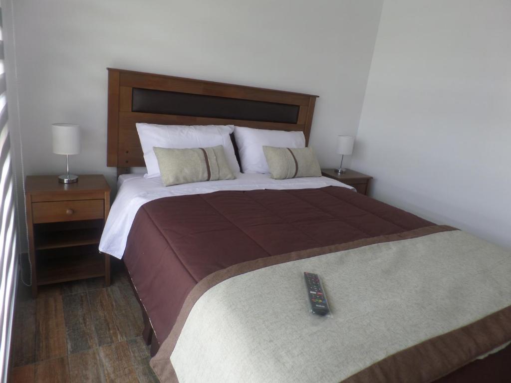 Postel nebo postele na pokoji v ubytování Carolina Hostal