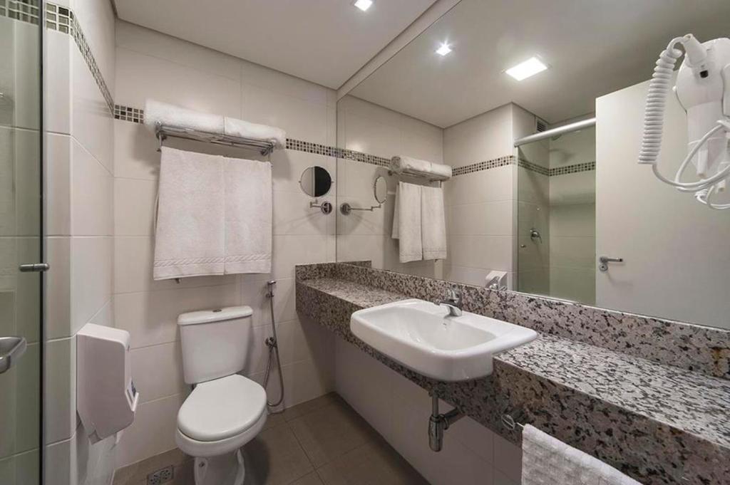 Koupelna v ubytování Hotel Laghetto Moinhos