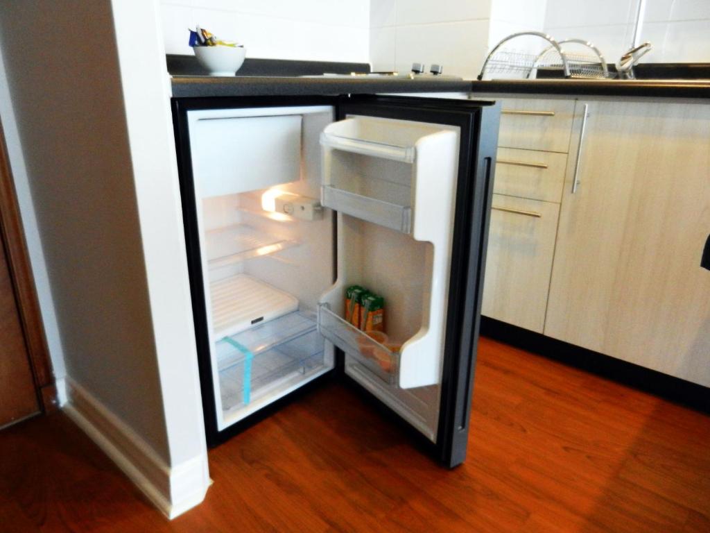 Kuchyň nebo kuchyňský kout v ubytování Apartamentos Terrazas de Talca