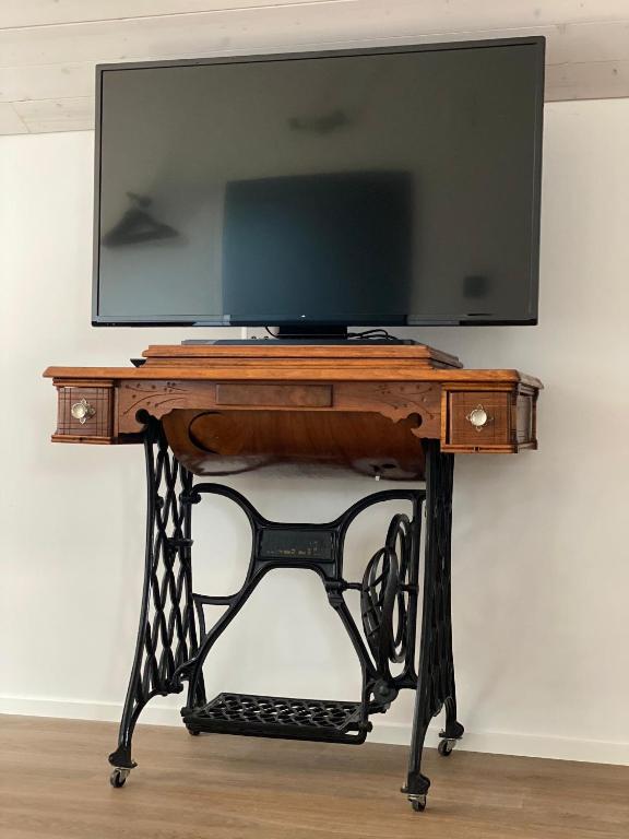 TV a/nebo společenská místnost v ubytování B&B Cà Nosa