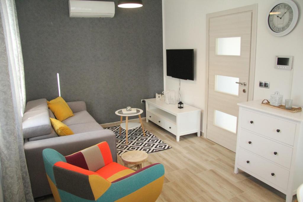 Televízia a/alebo spoločenská miestnosť v ubytovaní Apartman Rina,Biograd na moru