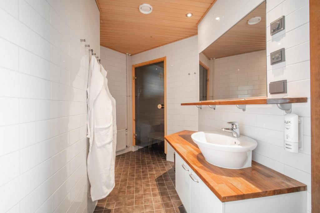 Koupelna v ubytování Ski-Inn RukaVillage