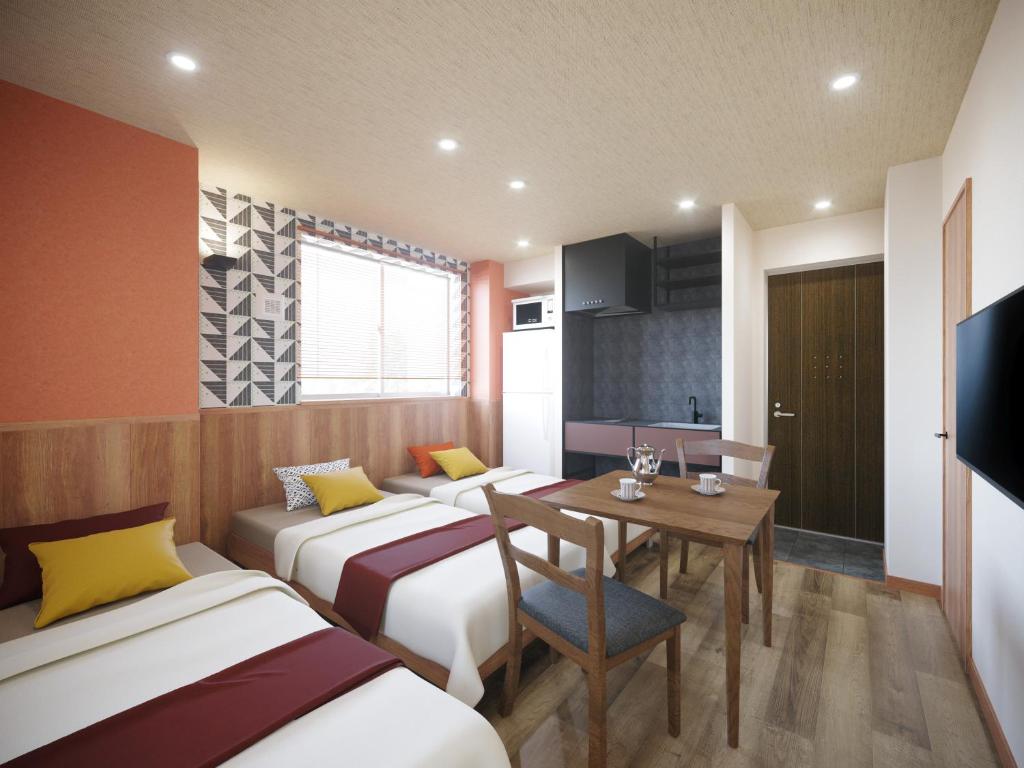 TV a/nebo společenská místnost v ubytování WIRES HOTEL James zaka