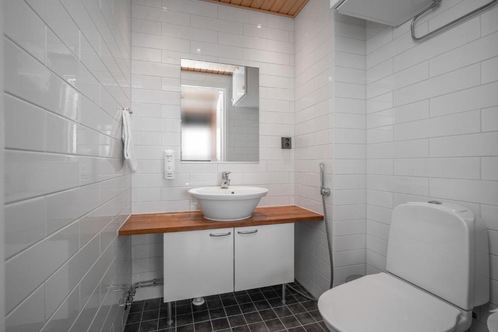 Koupelna v ubytování Ski-Inn RukaVillage