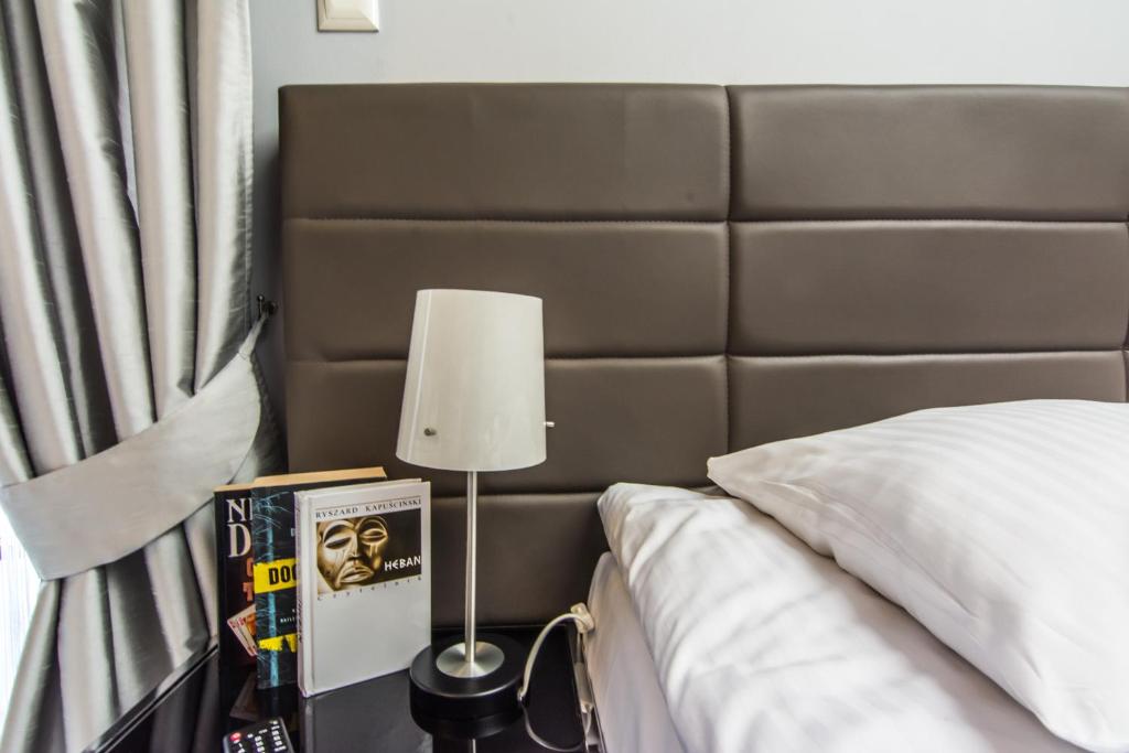 Posteľ alebo postele v izbe v ubytovaní Apartamenty hoteLOVE na Skale