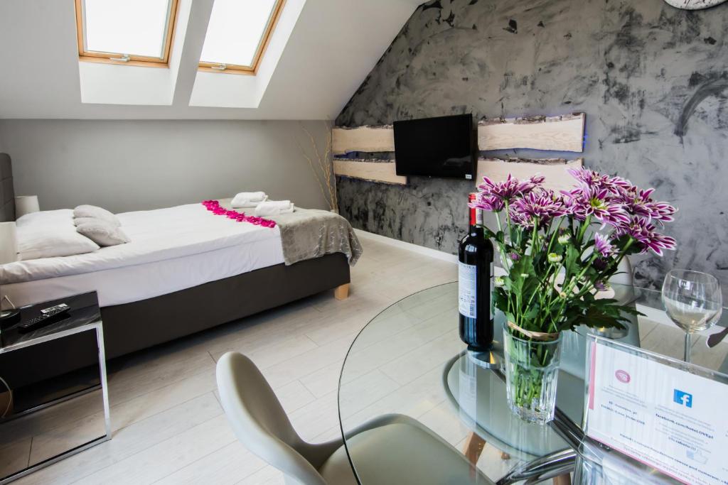 Posteľ alebo postele v izbe v ubytovaní Apartamenty hoteLOVE na Skale