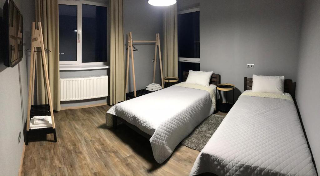 Postel nebo postele na pokoji v ubytování Авиатик