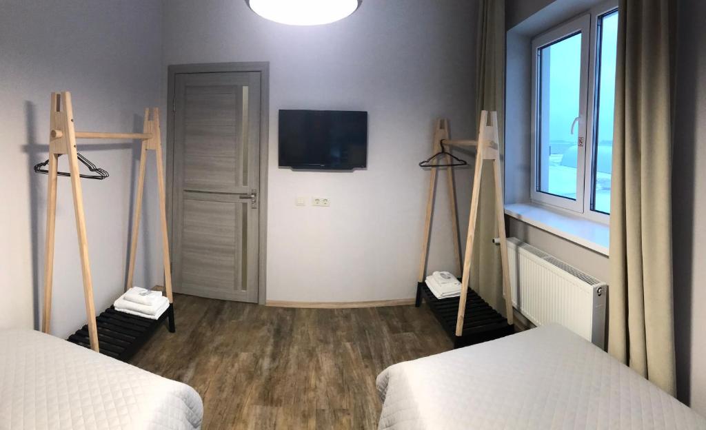 Postel nebo postele na pokoji v ubytování Авиатик