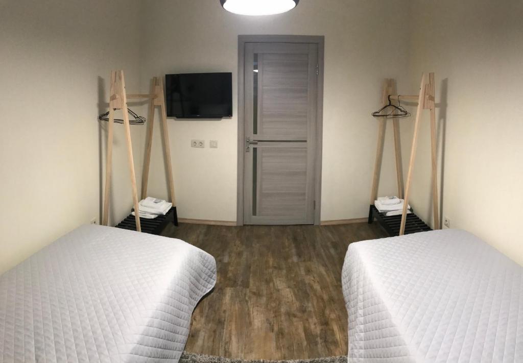 Postel nebo postele na pokoji v ubytování Авиатик