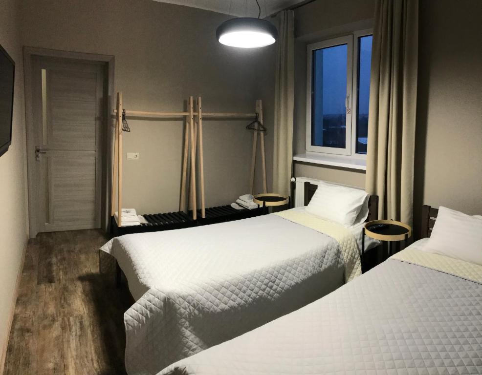 Postel nebo postele na pokoji v ubytování Авиатик