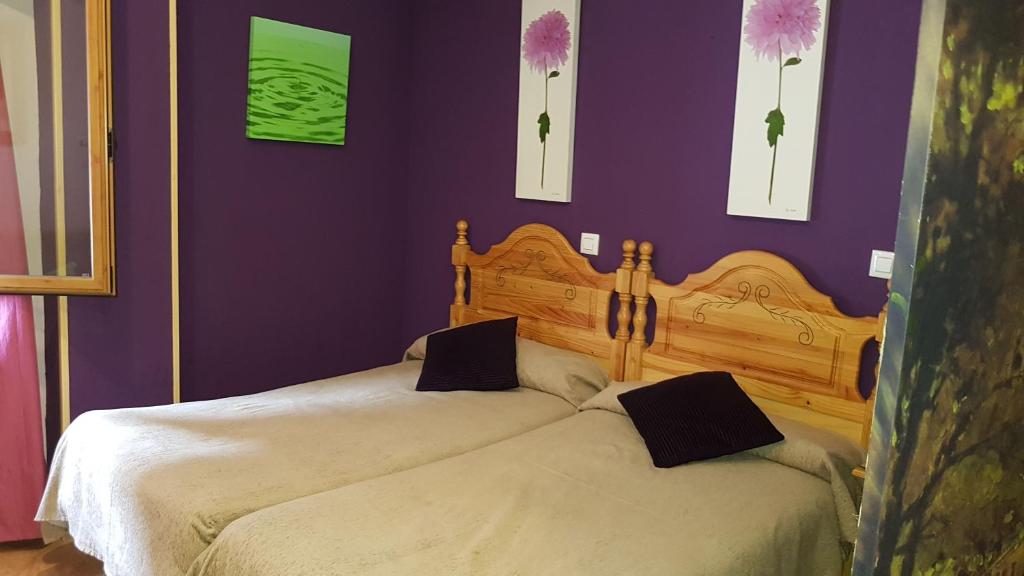 Łóżko lub łóżka w pokoju w obiekcie Apartamentos Castillo Cazorla