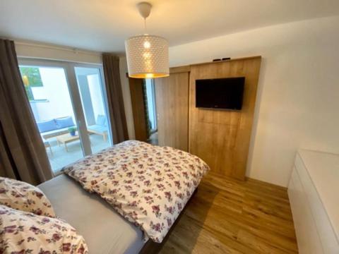 Postel nebo postele na pokoji v ubytování Dream apartman