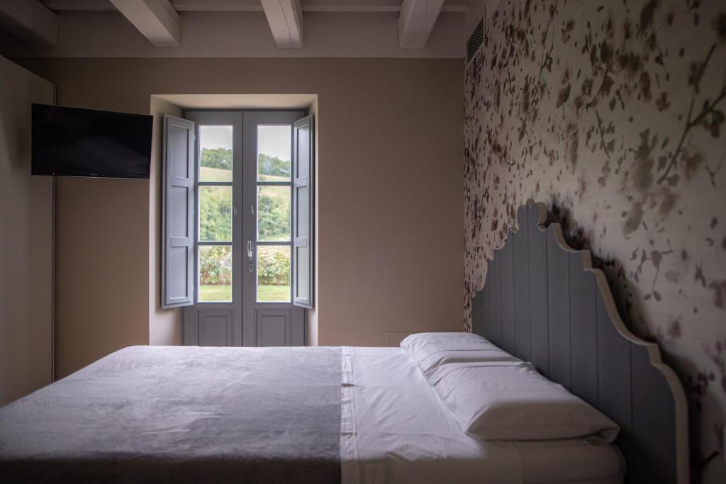 Agriturismo Colle Casini Cortesi - Habitación Cuádruple Superior