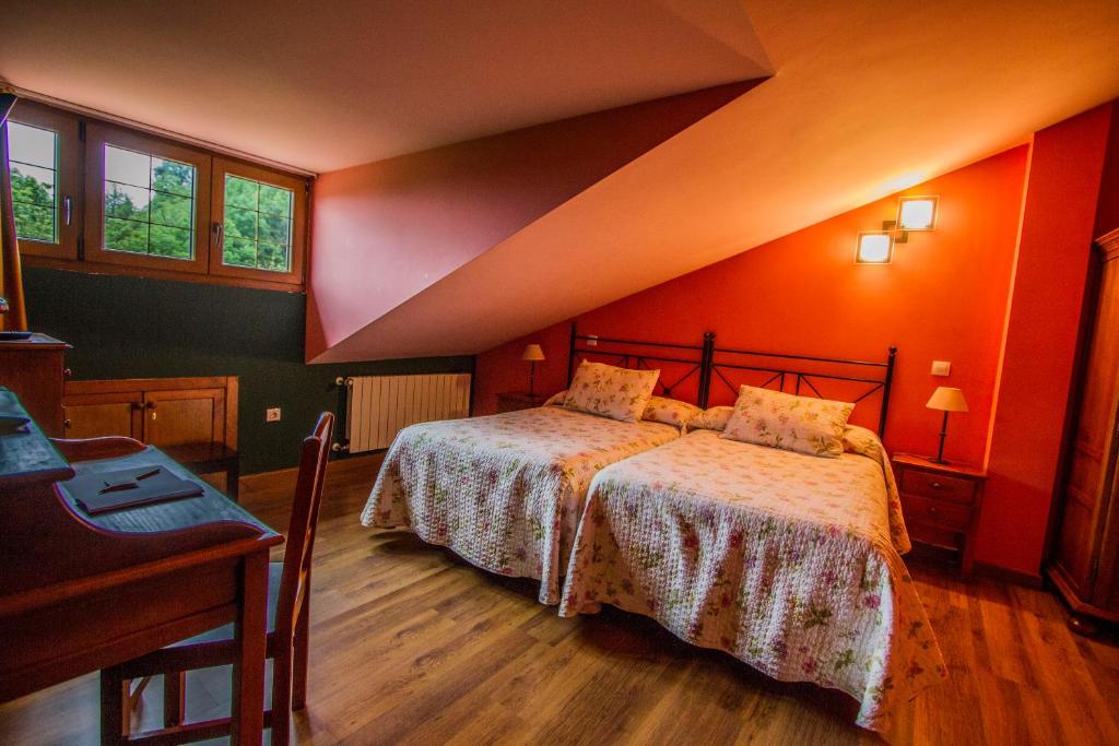 Postel nebo postele na pokoji v ubytování Posada de Villacarriedo