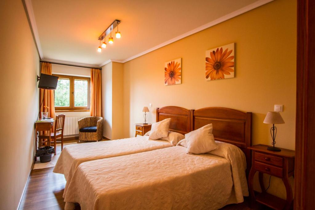 Postel nebo postele na pokoji v ubytování Posada de Villacarriedo