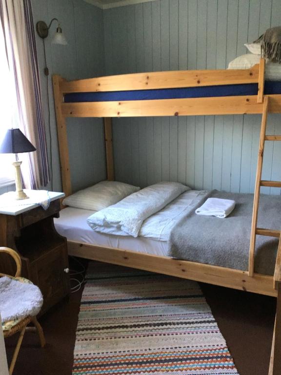 Postel nebo postele na pokoji v ubytování Skagakaia