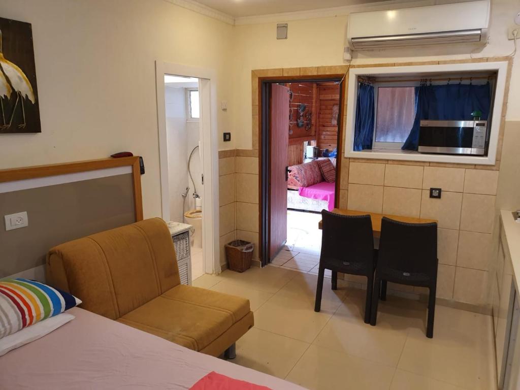 Postel nebo postele na pokoji v ubytování Shefer Guesthouse