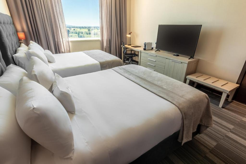 TV a/nebo společenská místnost v ubytování MDS Hotel Chillan
