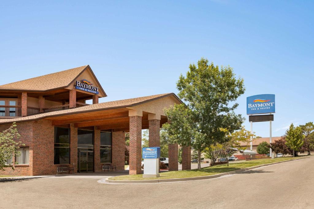 a building with a sign in front of it at Baymont by Wyndham Cortez in Cortez