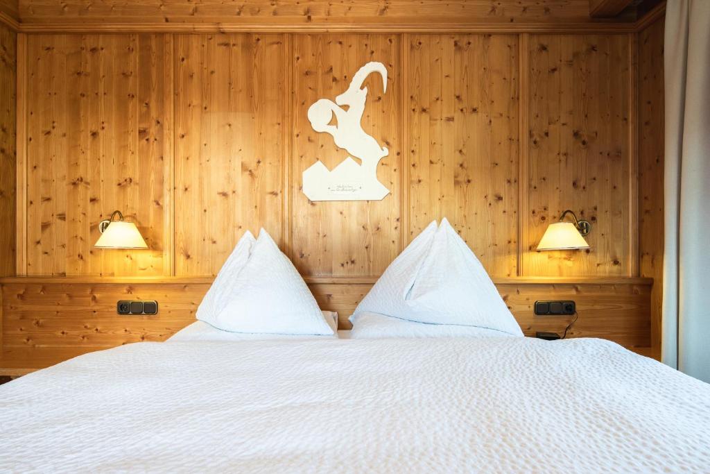 Postel nebo postele na pokoji v ubytování Gästehaus Stotter