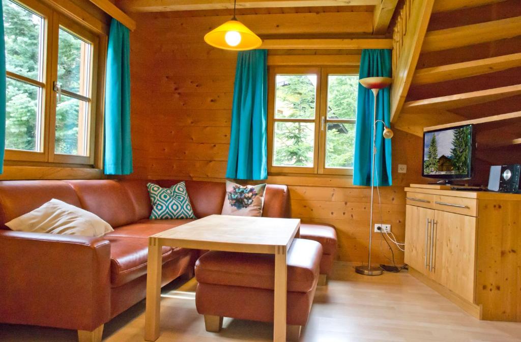 Televízia a/alebo spoločenská miestnosť v ubytovaní Appartement Ramsau, Haus Fichte