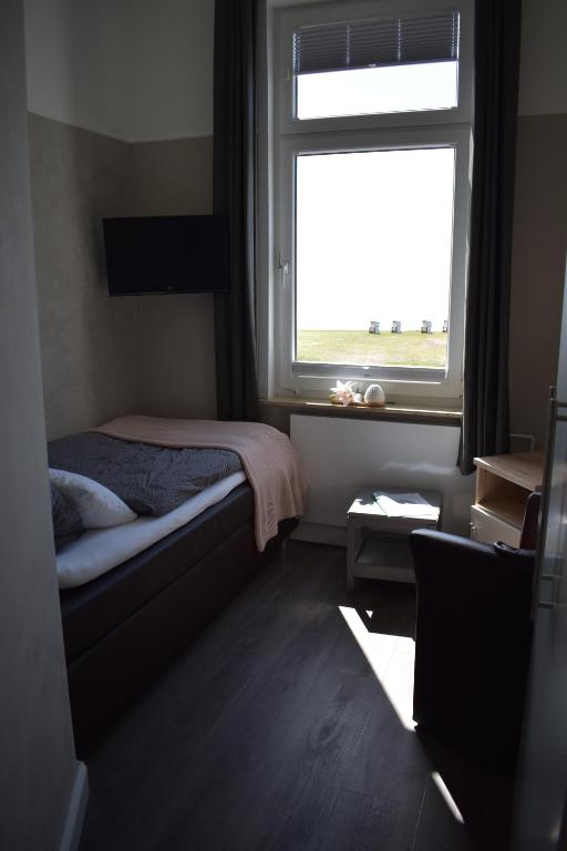 Postel nebo postele na pokoji v ubytování Haus Neunaber