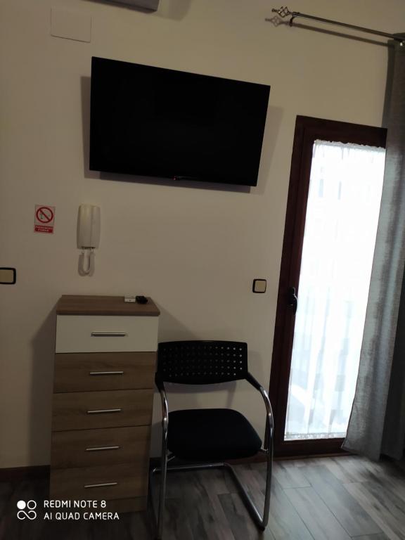 Telewizja i/lub zestaw kina domowego w obiekcie El LEGADO