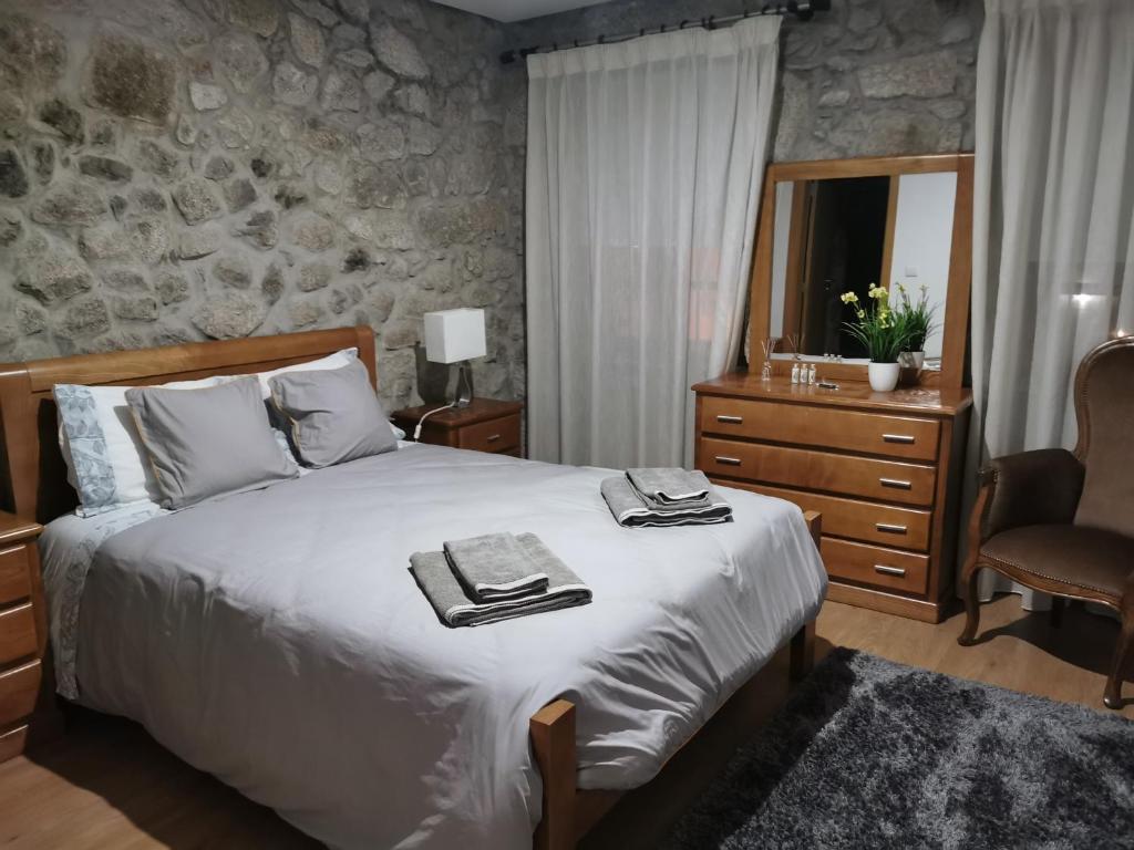 Postel nebo postele na pokoji v ubytování Isabel do Couto - casa de charme