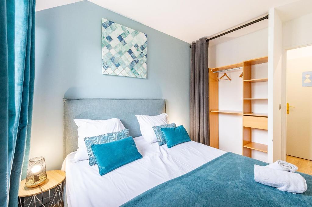 Ένα ή περισσότερα κρεβάτια σε δωμάτιο στο The Fabulous - Apartment 6 Pers 10min Disney