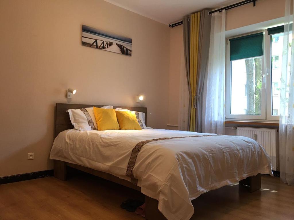 Posteľ alebo postele v izbe v ubytovaní Travel Apartment