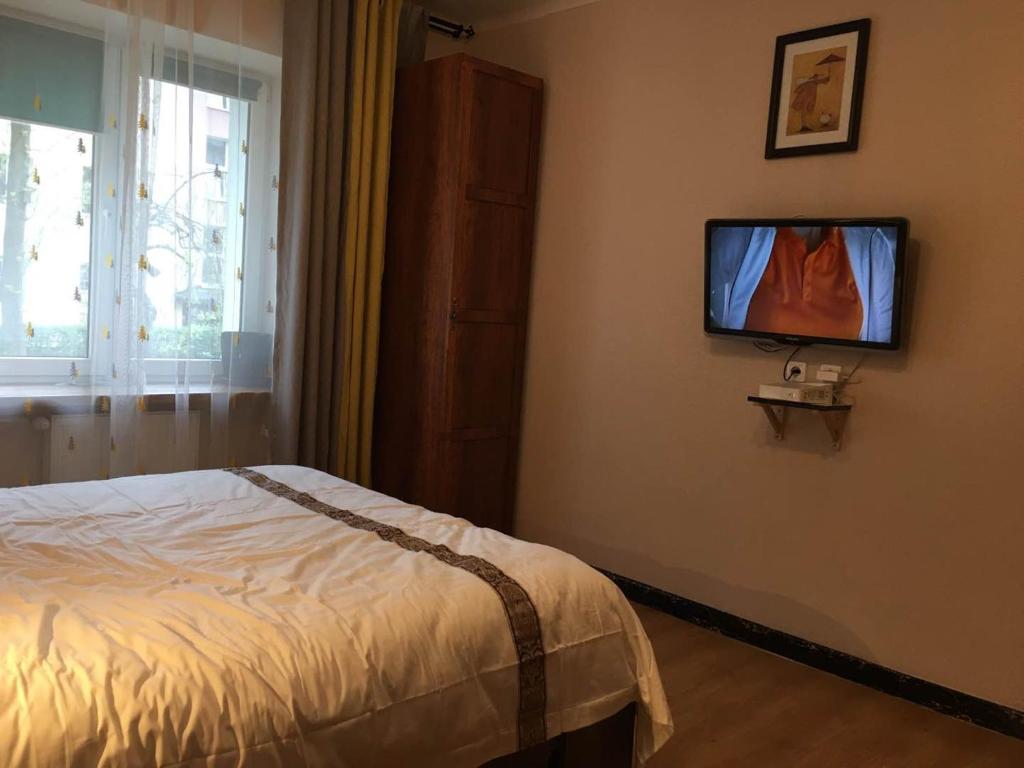 Posteľ alebo postele v izbe v ubytovaní Travel Apartment