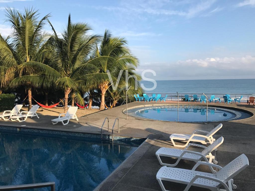 Bazén v ubytování Resort Playa Azul Departamentos frente al mar nebo v jeho okolí