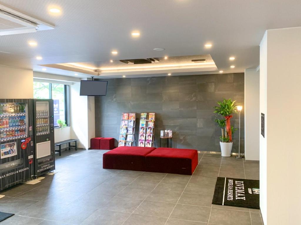 TV a/nebo společenská místnost v ubytování HOTEL LiVEMAX Hiroshima Peace Park Mae