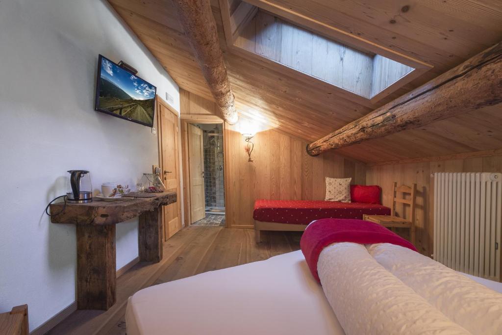 TV a/nebo společenská místnost v ubytování Agriturismo Baita De L'ALL