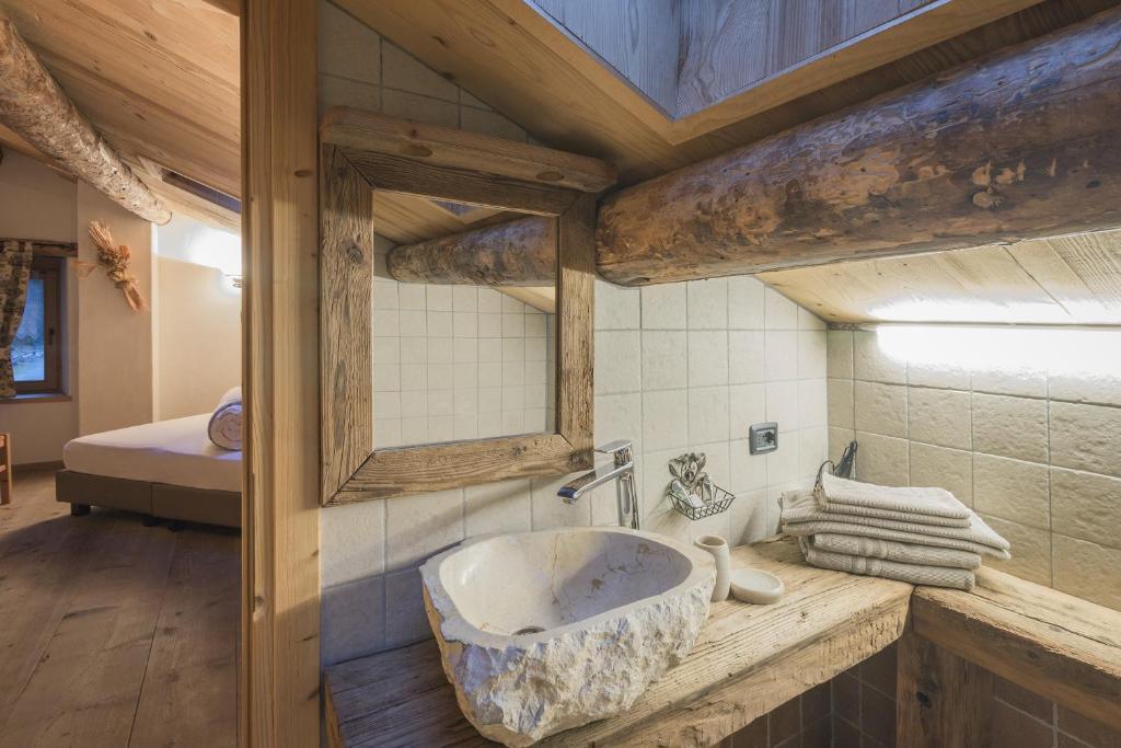 Koupelna v ubytování Agriturismo Baita De L'ALL