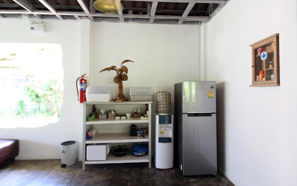 Kuchyň nebo kuchyňský kout v ubytování Malee Malee Guesthouse
